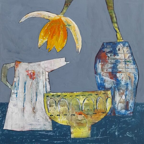 Three Vessels and Daffs" is a still life depicting a yellow daffodil drooping from a blue vase, alongside a white jug and a patterned yellow bowl on a blue-grey background.